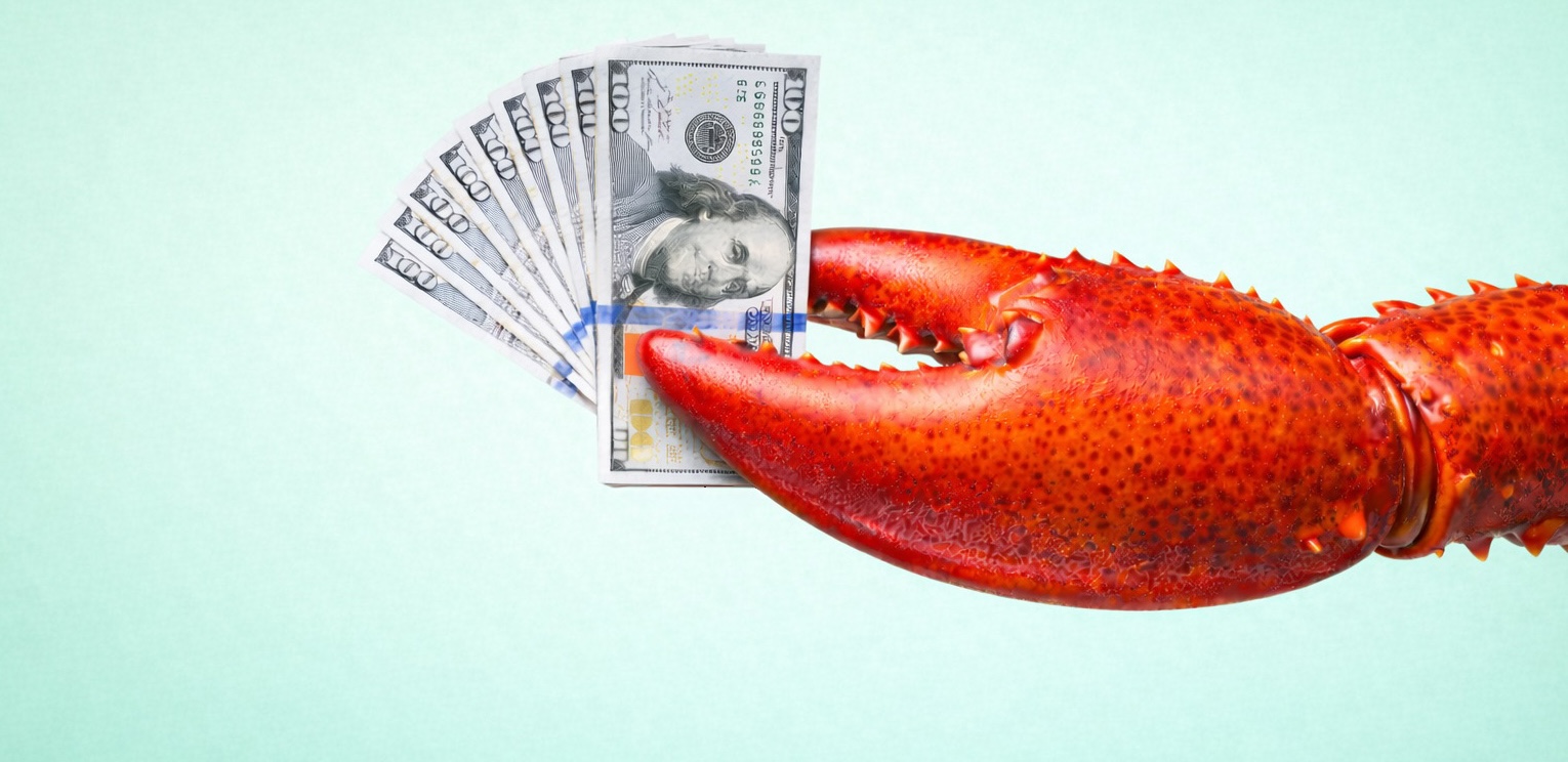 Lobster claw holding cash